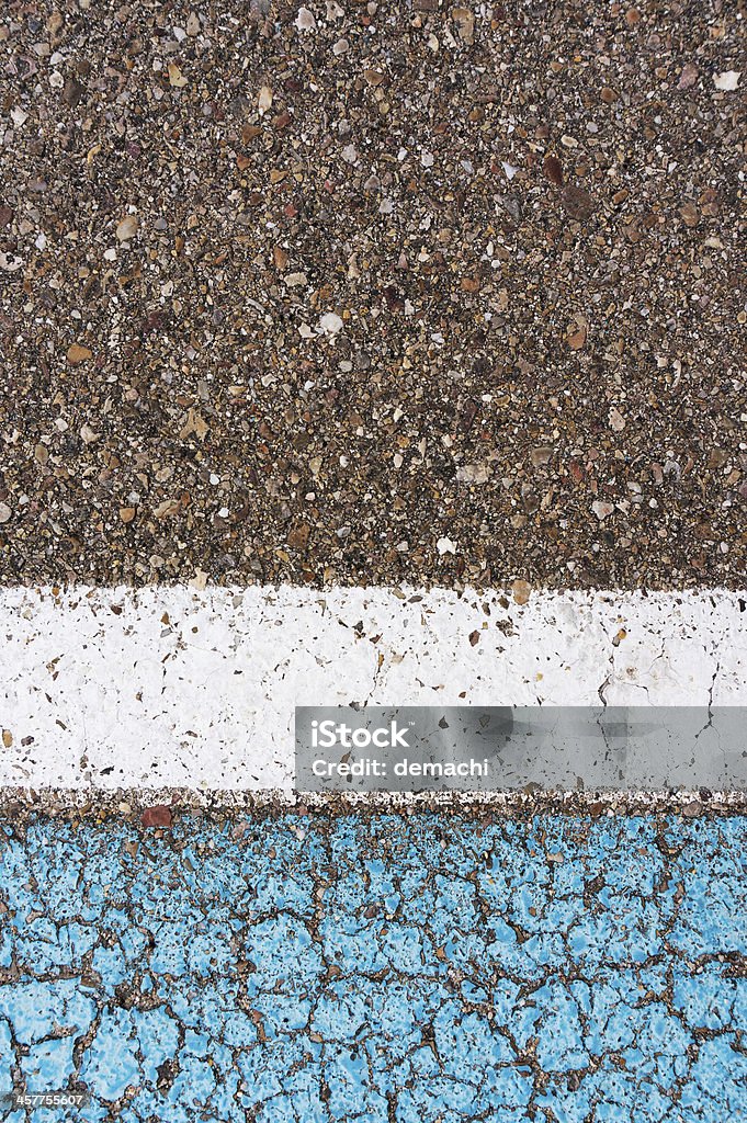 Weathered cement floor detail Weathered cement floor detail with blue and white paint. Macro shot for backgrounds or texture Abandoned Stock Photo