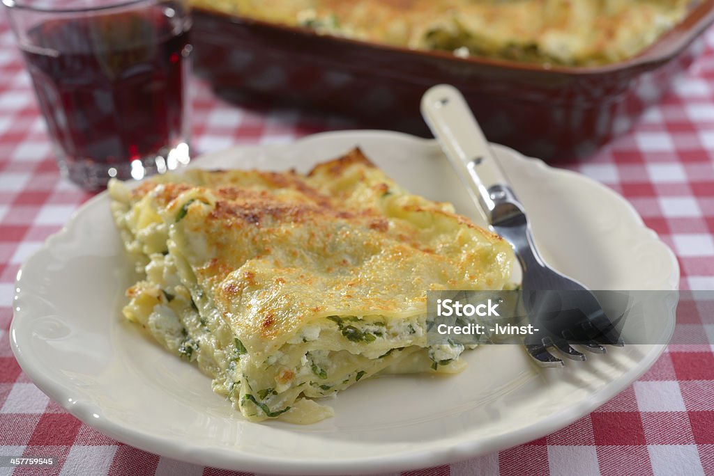 Lasagna with ricotta and spinach on a table Lasagna Stock Photo