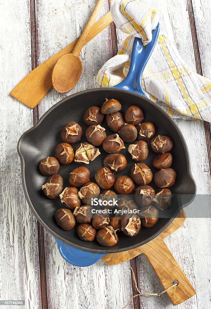 Roasted chestnuts in the pan. Autumn Stock Photo