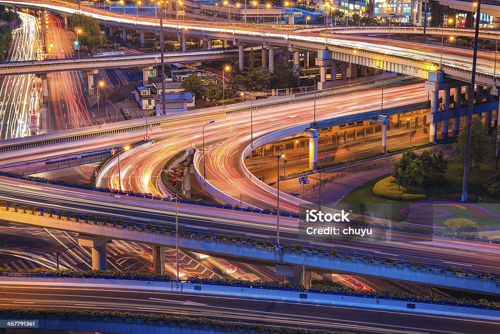 shanghai elevated road junction at night shanghai elevated road junction closeup with light trails at night Architecture Stock Photo