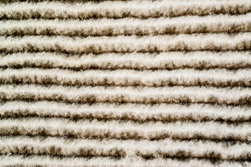 Closeup image of dirty furnace air filter