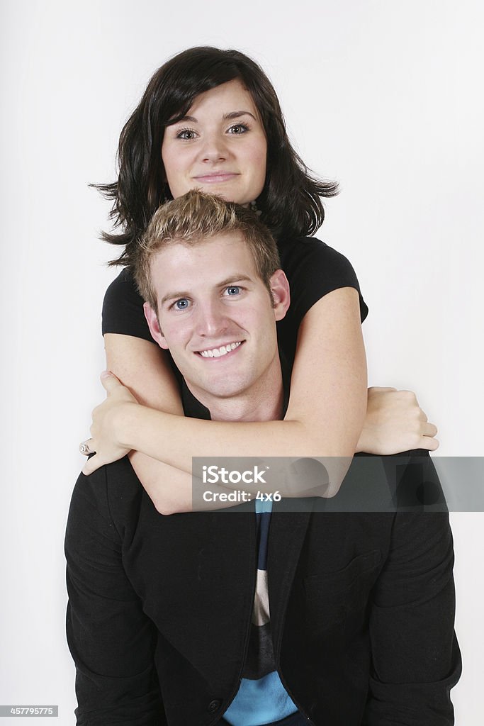 Piggy back couple Piggy back couplehttp://www.twodozendesign.info/i/1.png 20-24 Years Stock Photo