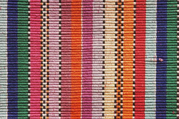 Colorful woven rug striped textile.