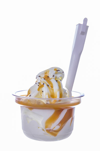 istock vanilla ice cream with caramel topping 457821005