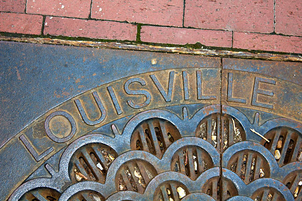 Louisville - manhole cover Louisville - manhole cover in the center of the city louisville kentucky stock pictures, royalty-free photos & images