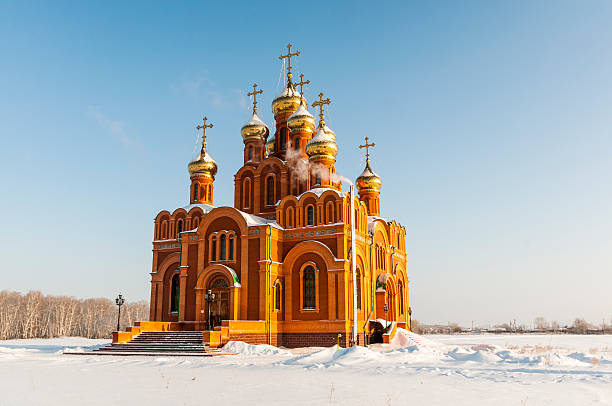 istock Russian cathedral on a snowy field. Siberia 457837697