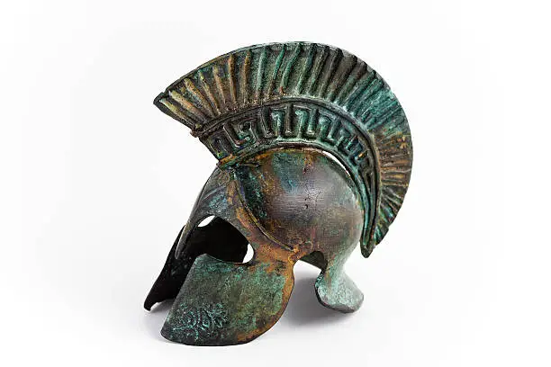 Old trojan helmet on white background.