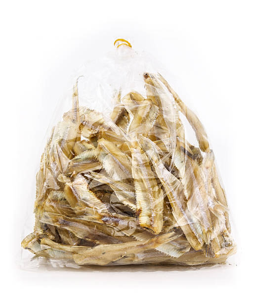 istock Bag of dry fish on white background 457852177