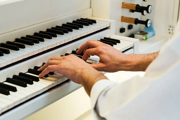 istock Hands on the piano at a concert 457856007