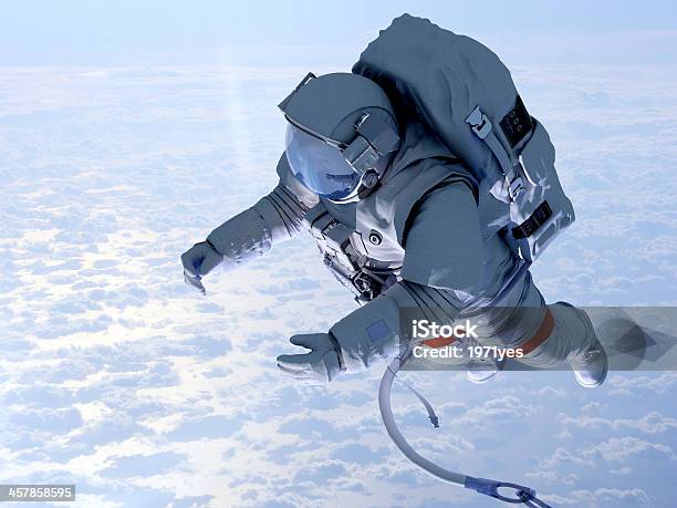 Astronaut Above The Clouds Stock Photo - Download Image Now - Astronaut, NASA Kennedy Space Center, Cosmonaut