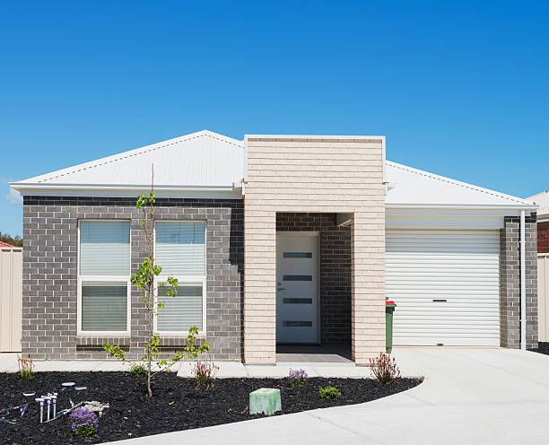 istock Modern suburban house with driveway 457869921