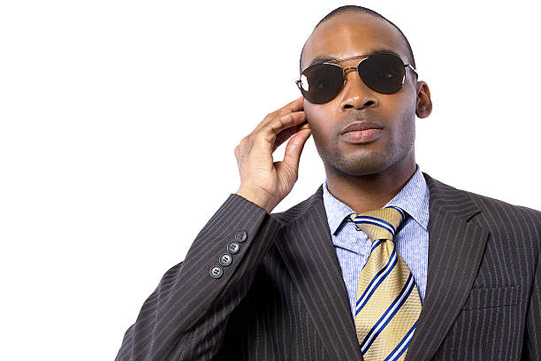 istock Black Bodyguard Wearing a Suit and Sun Glasses 457872213