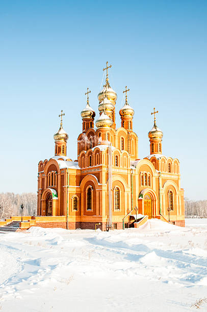 istock Russian cathedral on a snowy field. Siberia 457872245