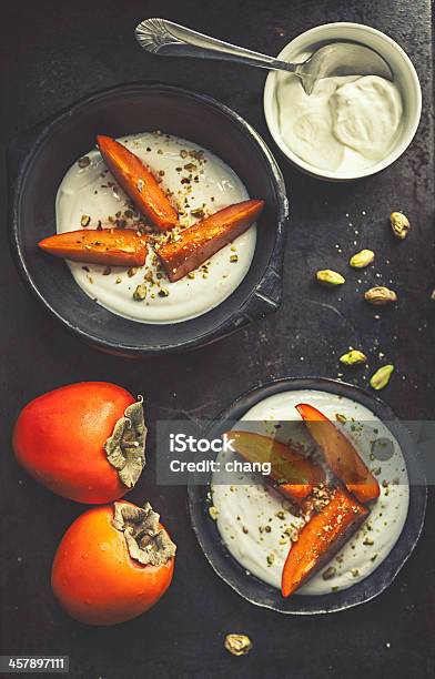 Persimmons Greek Yogurt Stock Photo - Download Image Now - Arrangement, Close-up, Color Image