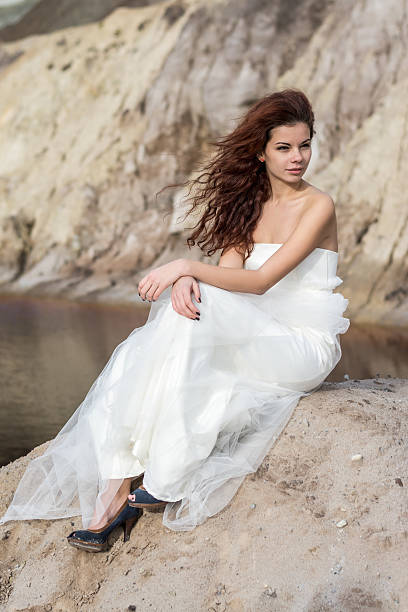 istock bride posing in a baren land 457898453