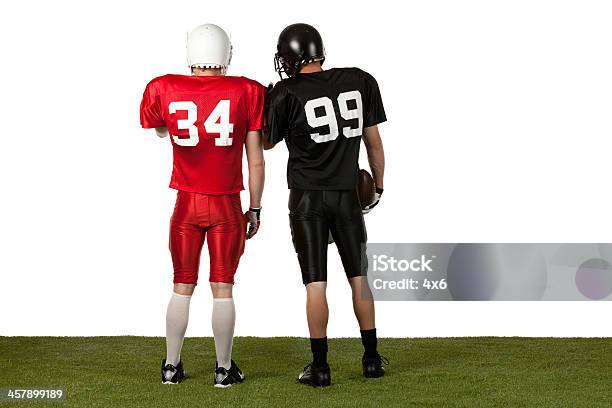 Rear View Of American Football Player Standing Stock Photo - Download Image Now - Rear View, American Football Player, Back