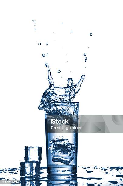 Water Splashes In The Glass Stock Photo - Download Image Now - Activity, Alcohol - Drink, Blue