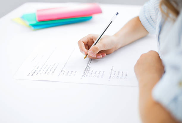 istock little girl taking test 457944177
