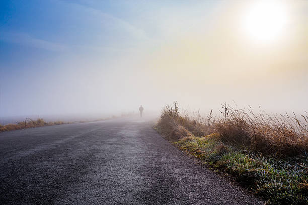 istock men silhouette in the fog 457945255