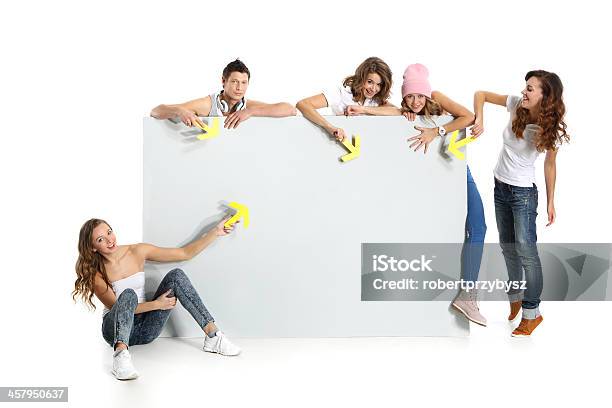 Youth And Empty White Board Stock Photo - Download Image Now - Comparison, Human Height, Marketing