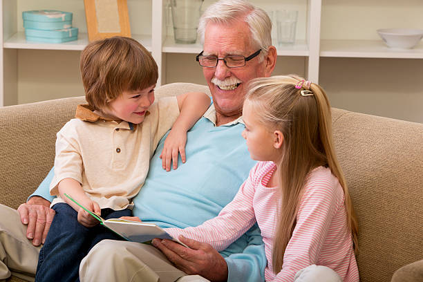 istock Grandfather with Grandchildren 457967189