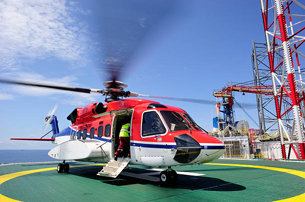 istock The offshore helicopter at an oil rig 457968563