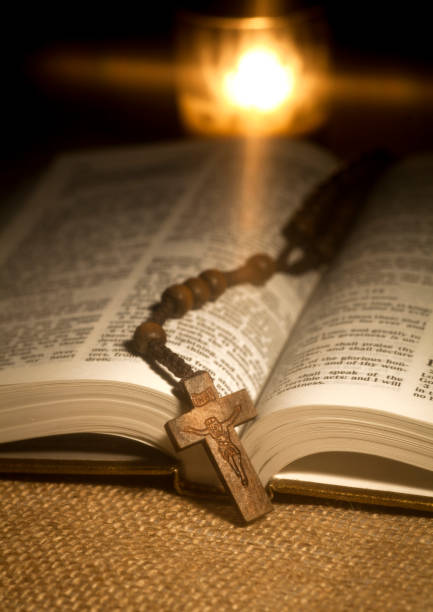 istock Holy Bible and Rosary Beads 457973475