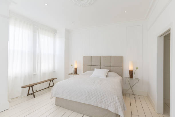 istock Bed and tables in modern bedroom 457977031