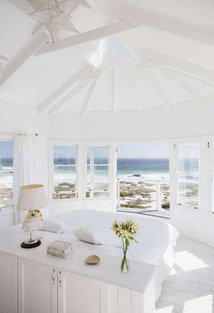 Bedroom overlooking ocean  beach house stock pictures, royalty-free photos & images