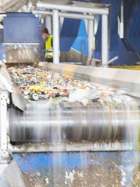 istock Recycled material on conveyor belt in recycling center 457978507