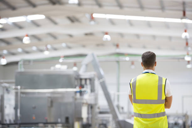 istock Worker standing in factory 457978753