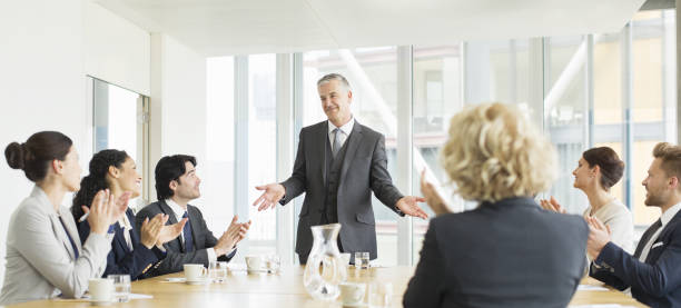 istock Business people clapping in meeting 457979195