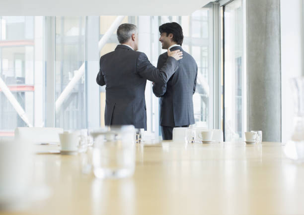 Bearded Business Partners Exchanging Ideas On How To Run Company