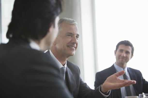 istock Businessmen talking in meeting 457979319