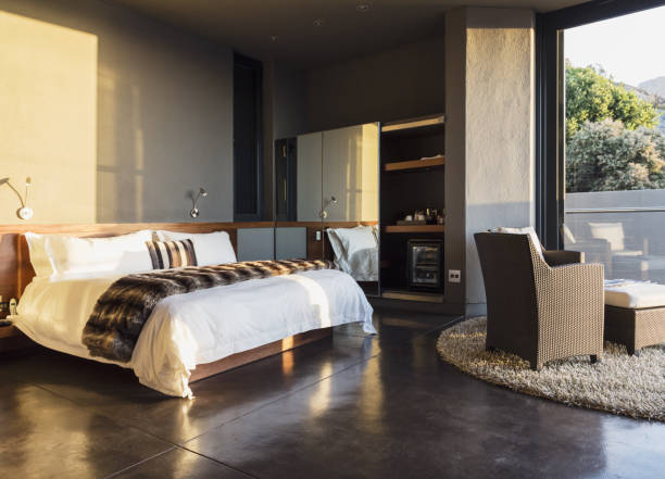 istock Armchair and bed in modern bedroom 457980387