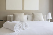 istock Towels on bed in bedroom 457982209