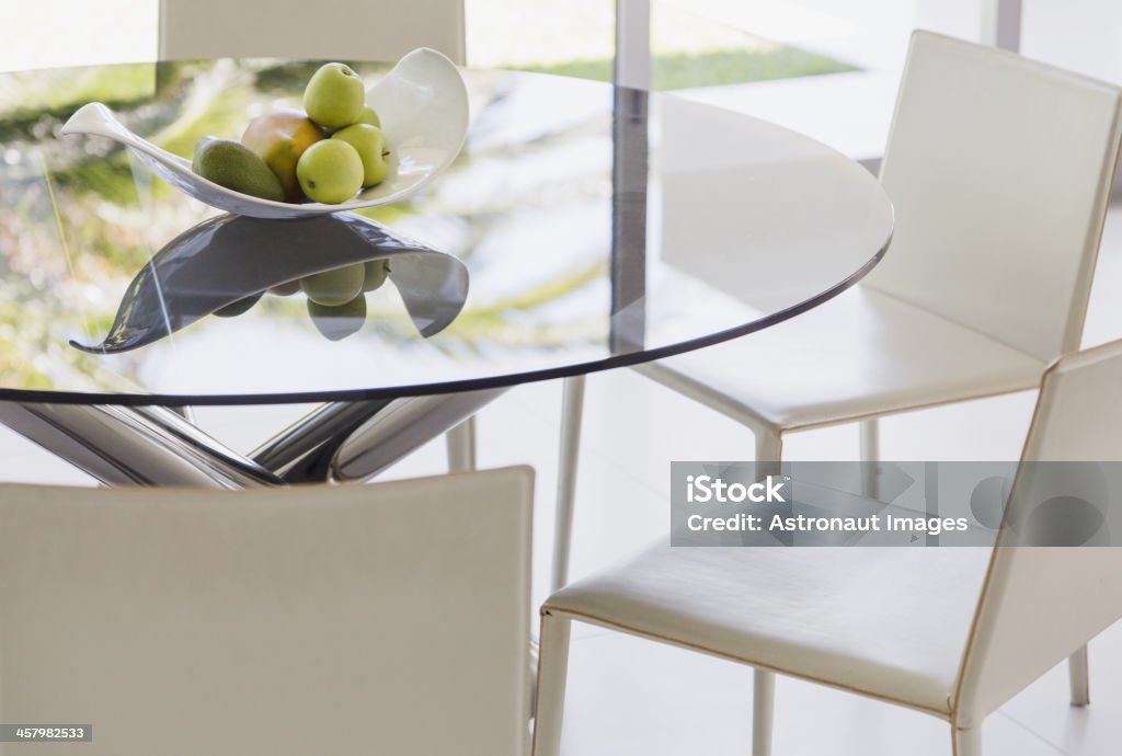 Modern dining table and chairs  Glass - Material Stock Photo