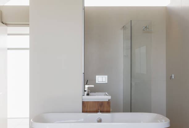istock Bathtub, shower and sink in modern bathroom 457982547