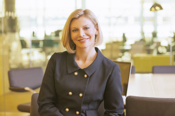 istock Businesswoman smiling in office 457982837