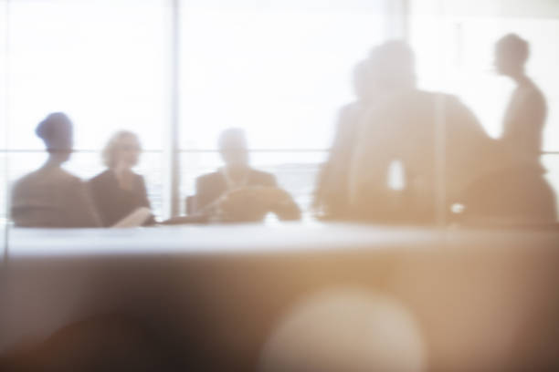 Silhouette of business people in meeting  soft focus stock pictures, royalty-free photos & images