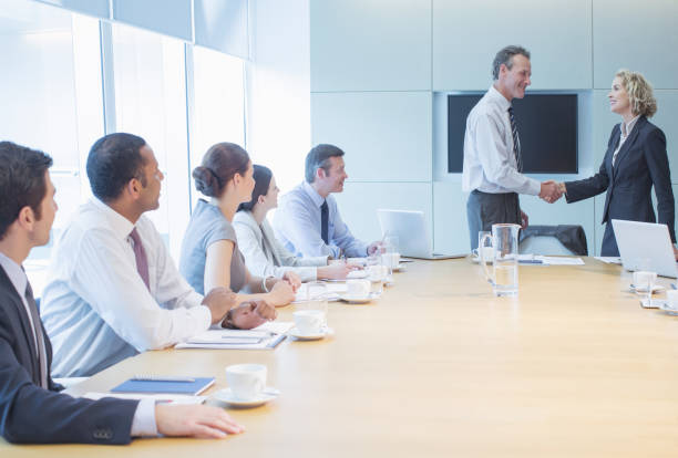 istock Business people shaking hands in office 457983215