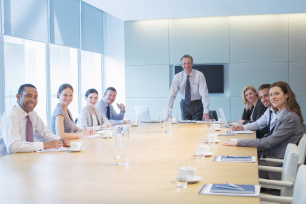istock Business people smiling in meeting 457983307
