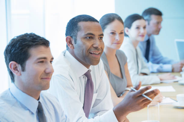 istock Business people talking in meeting 457983331