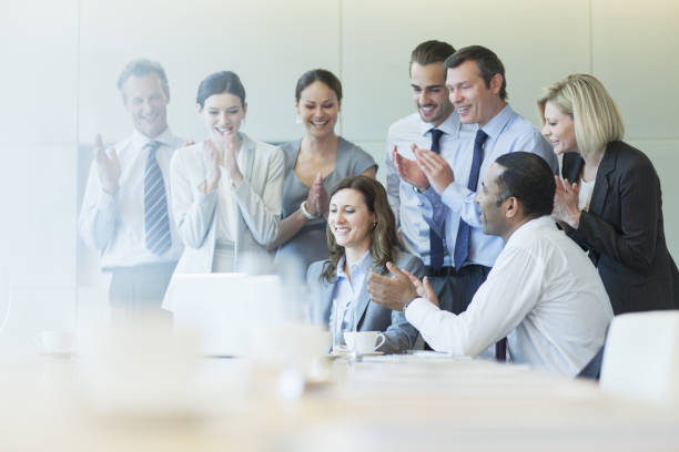 istock Business people cheering in meeting 457983561