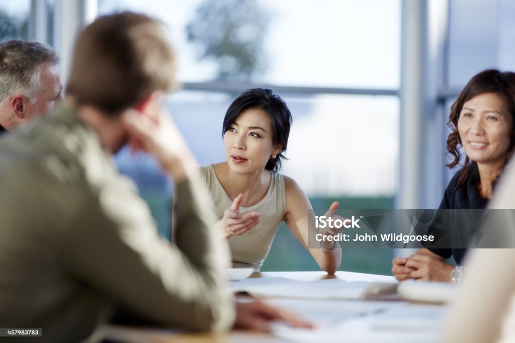 Business people talking in meeting  Business Meeting Stock Photo