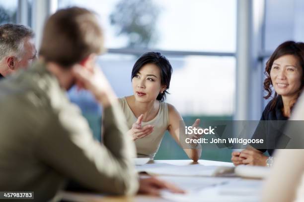 Business People Talking In Meeting Stock Photo - Download Image Now - Business Meeting, UK, Board Room