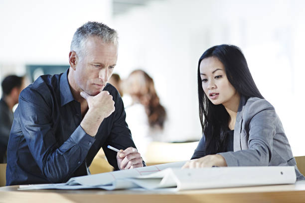 istock Business people talking in office 457983861
