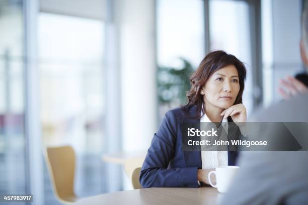 Business People Talking In Meeting Stock Photo - Download Image Now - Discussion, Listening, Meeting