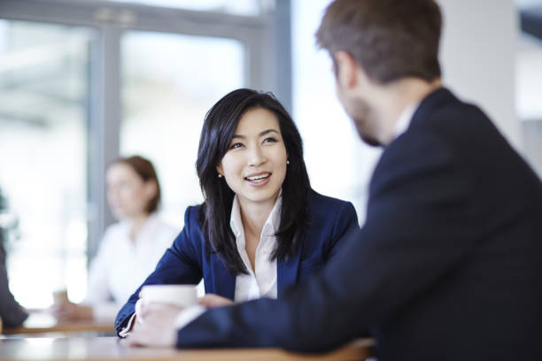 istock Business people talking in cafe 457983989