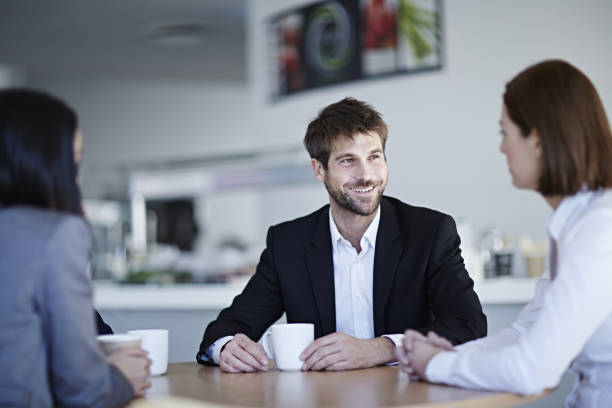 istock Business people talking in cafe 457984119